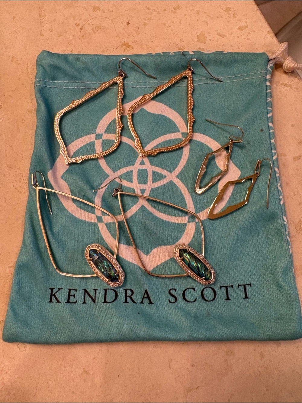 Kendra Scott tones of Gold & Rose Gold and Gold with Shell inlay.  3 Sets.
